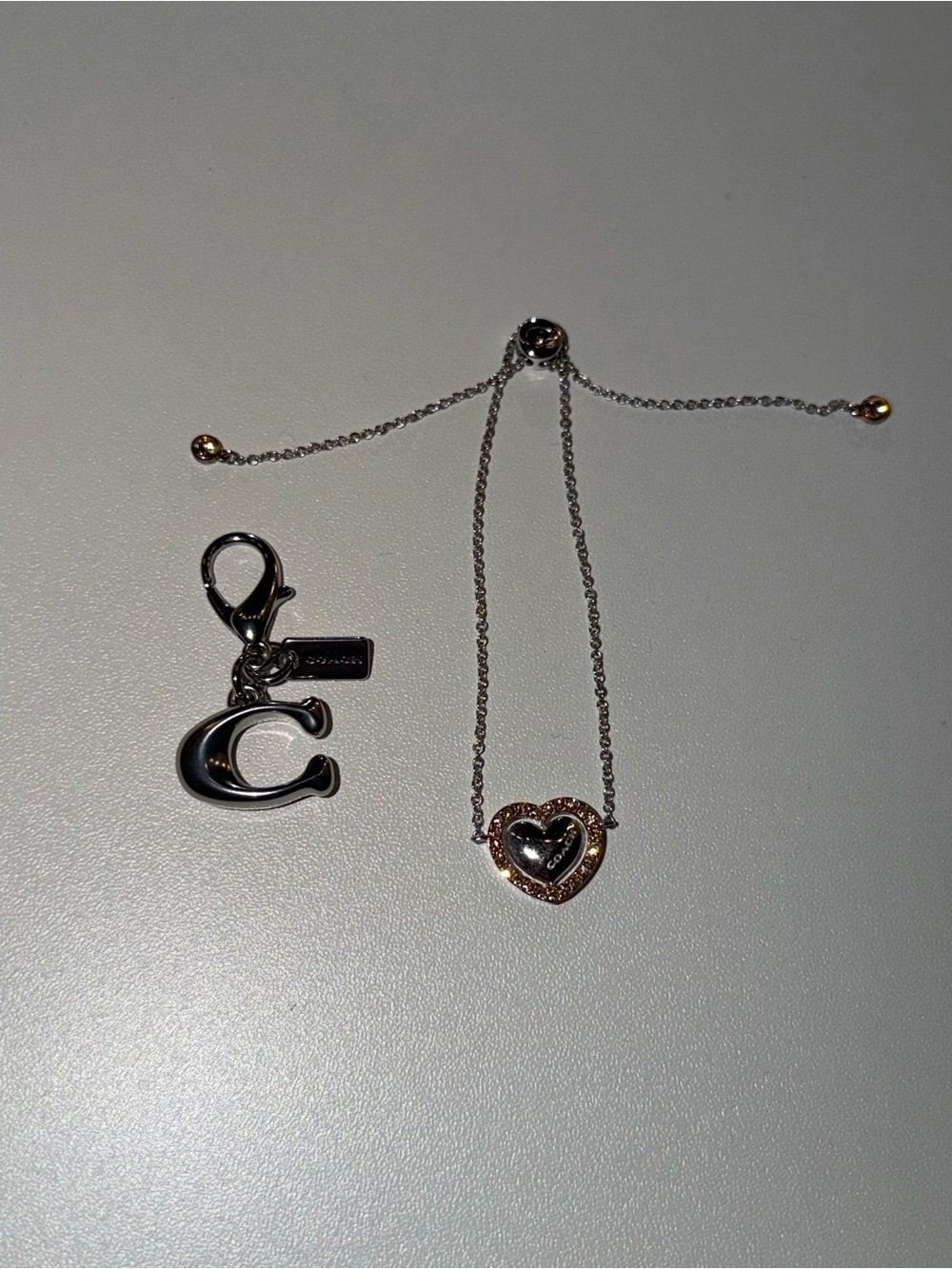 Coach Silver & Rose Gold Heart Slider Necklace with 'C' Charm